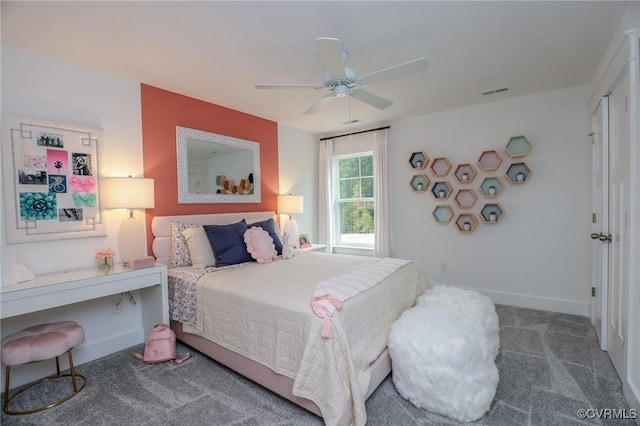 bedroom with visible vents, carpet flooring, a ceiling fan, and baseboards