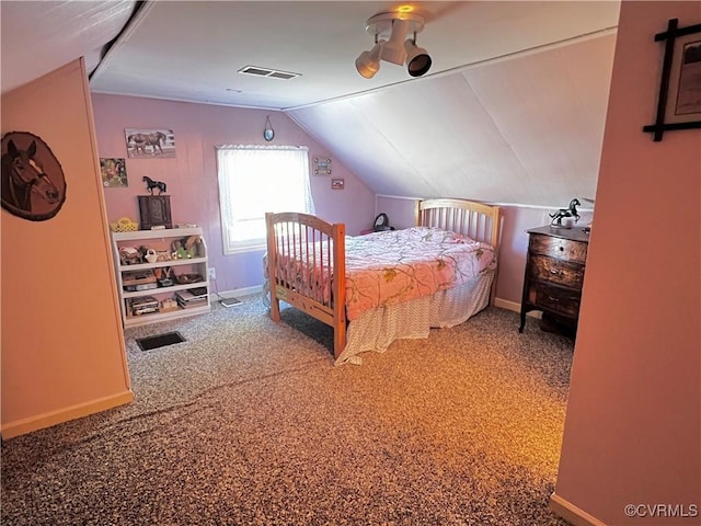 bedroom with baseboards, visible vents, carpet floors, and vaulted ceiling
