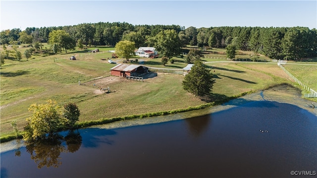 birds eye view of property with a water view and a rural view