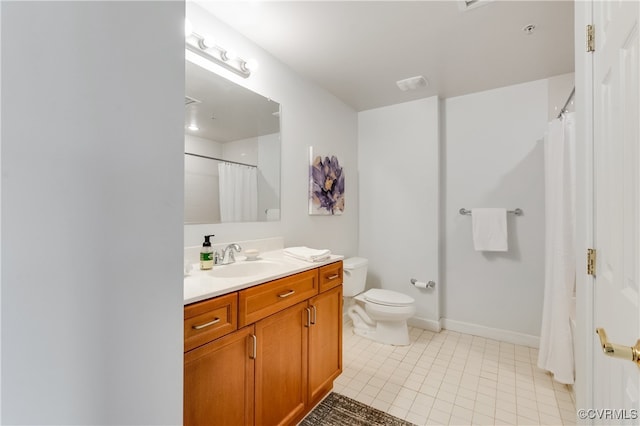 bathroom featuring a shower with shower curtain, tile patterned floors, vanity, and toilet