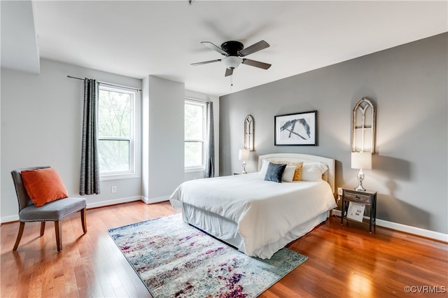 bedroom featuring ceiling fan and wood-type flooring