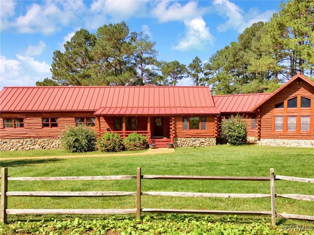 log home with a front yard