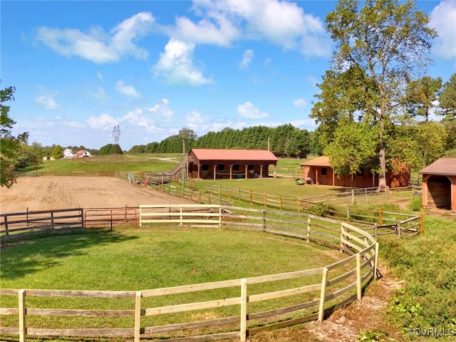 view of yard with a rural view