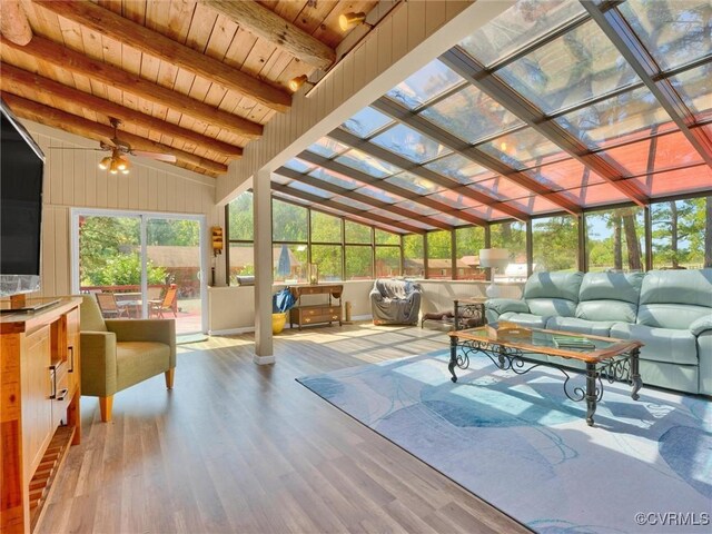 living room featuring light hardwood / wood-style flooring, wood ceiling, vaulted ceiling with beams, and ceiling fan