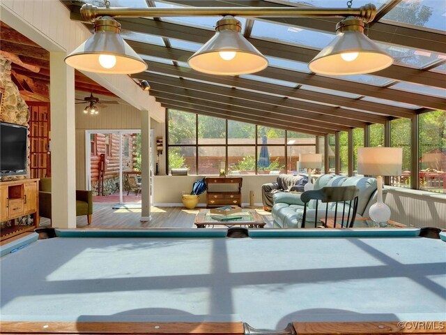 interior space featuring lofted ceiling, ceiling fan, and billiards