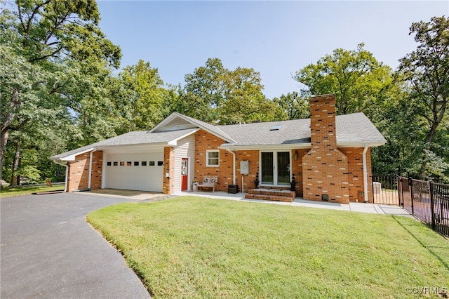 ranch-style house with a front yard and a garage