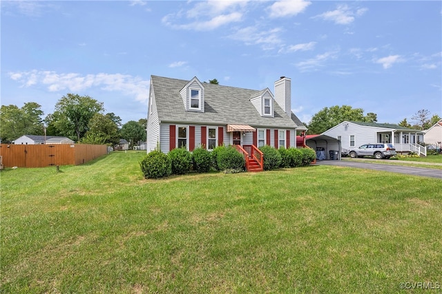 cape cod-style house with a front yard