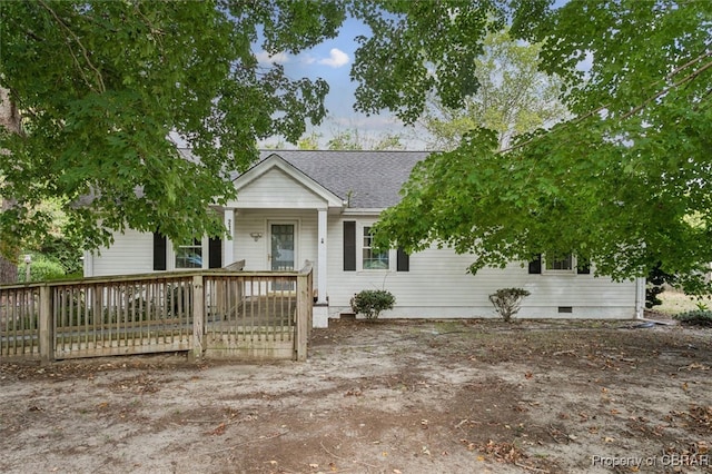 single story home featuring a deck