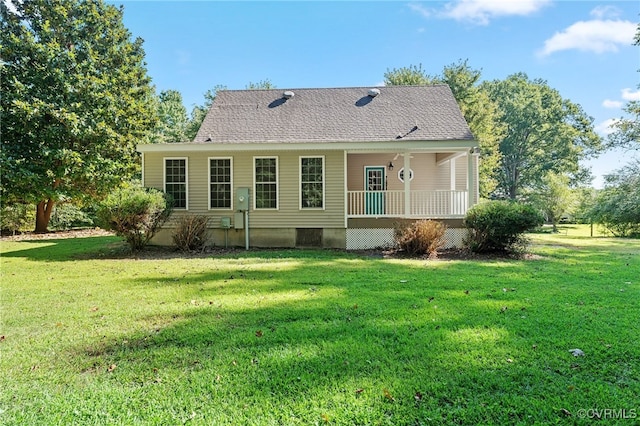 back of house with a porch and a yard