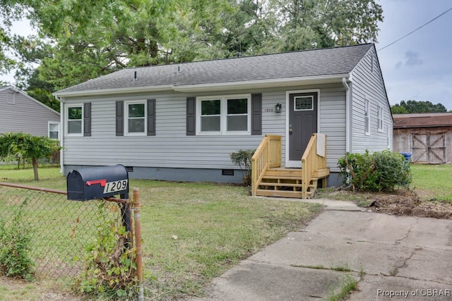 view of front of property featuring a front yard