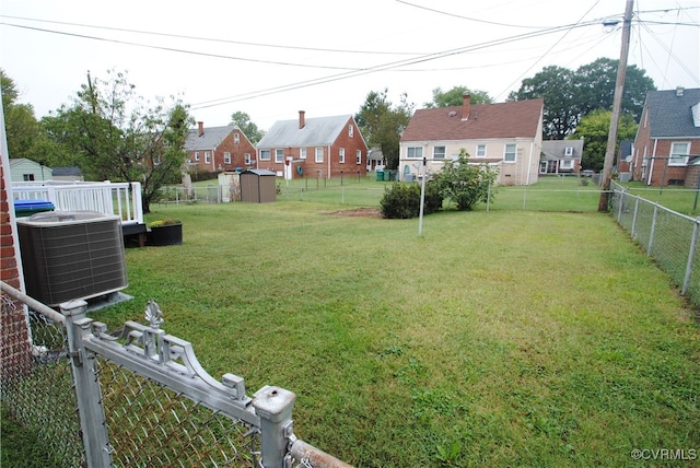 view of yard with central AC