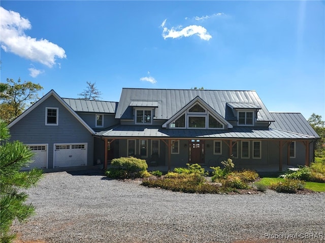 view of front facade featuring a garage and a porch