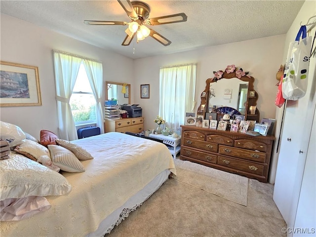288 Cole Comfort Rd, Dillwyn, VA 23936 - bedroom with light carpet, a textured ceiling, and a ceiling fan
