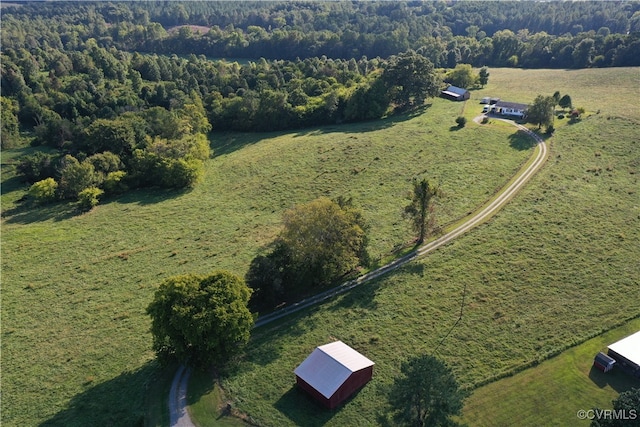 birds eye view of property featuring a rural view