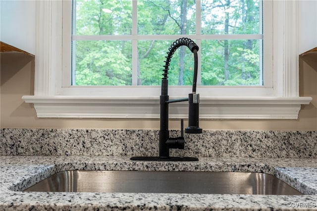 details with light stone counters and sink