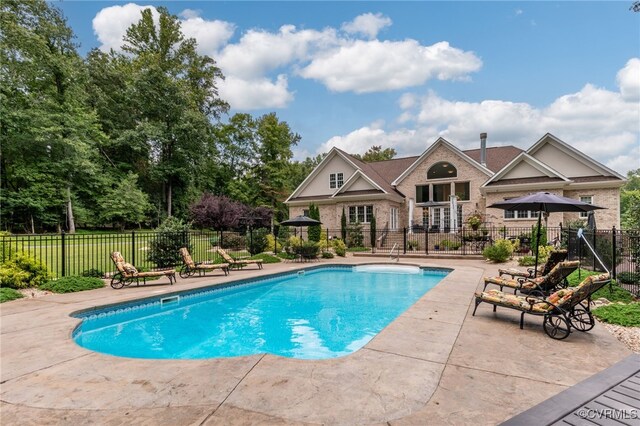 view of pool featuring a patio area and a gazebo