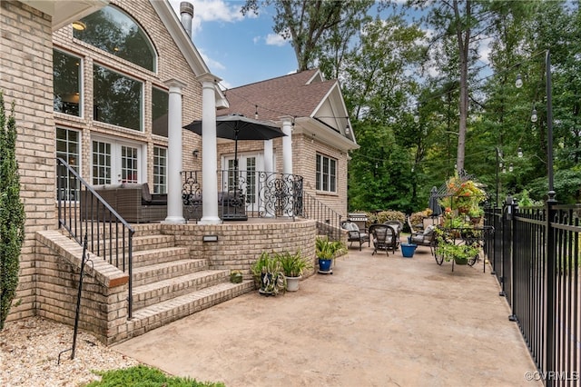 view of home's exterior featuring a patio area