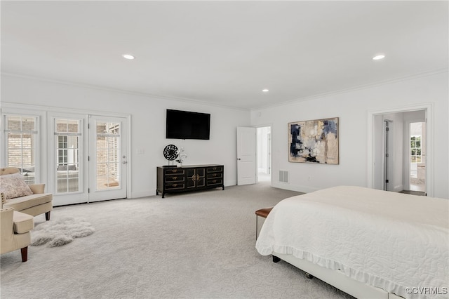 carpeted bedroom with access to outside, crown molding, and multiple windows