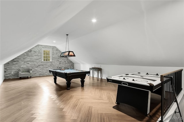 playroom featuring vaulted ceiling, light parquet floors, and billiards