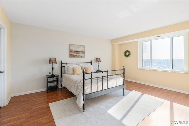 bedroom featuring hardwood / wood-style floors