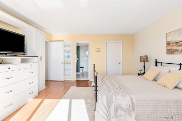 bedroom with light hardwood / wood-style flooring