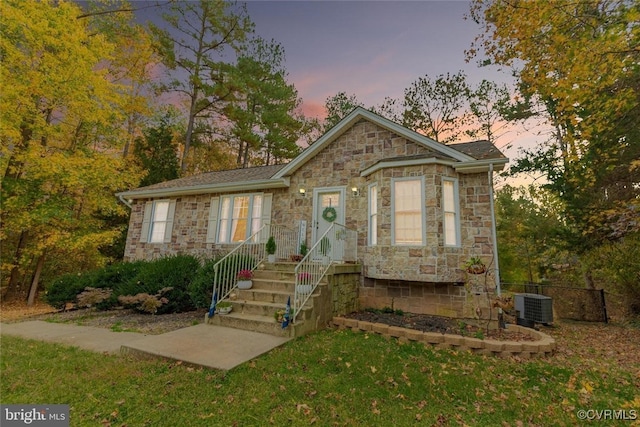 view of front of home featuring central AC unit