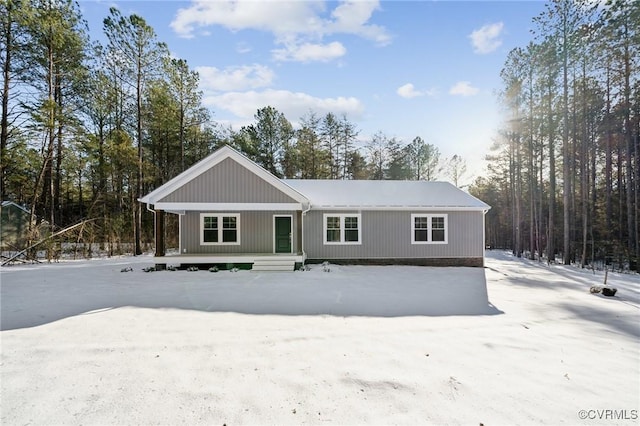 ranch-style home featuring covered porch