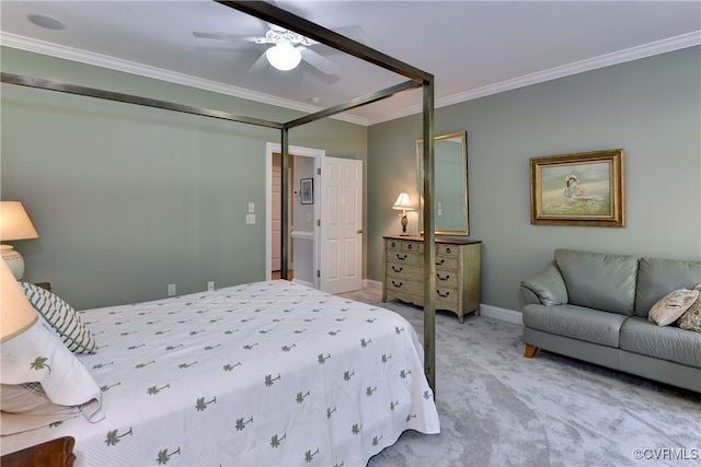 carpeted bedroom with ceiling fan and ornamental molding