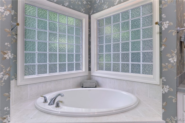 bathroom with tiled tub