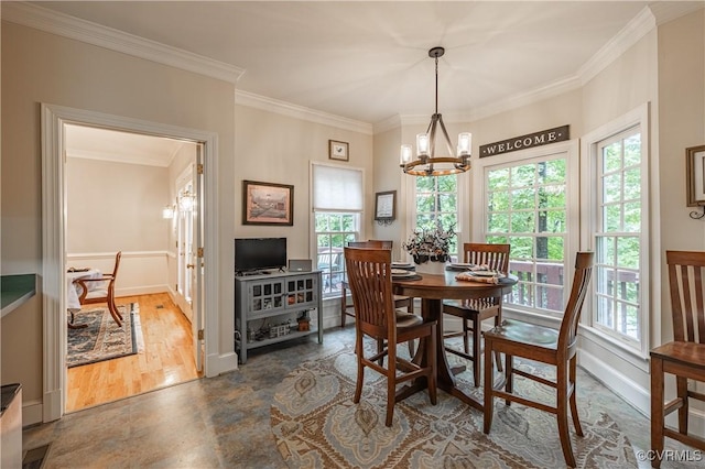 dining room with crown molding, dark hardwood / wood-style floors, a wealth of natural light, and a chandelier