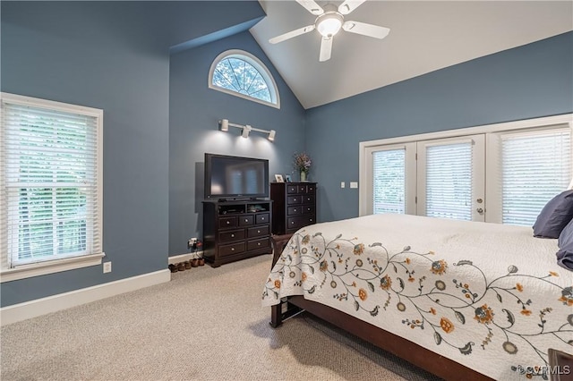 carpeted bedroom with ceiling fan, high vaulted ceiling, and access to outside