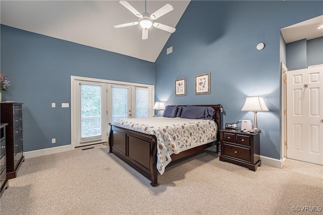 bedroom with ceiling fan, high vaulted ceiling, light carpet, and access to outside