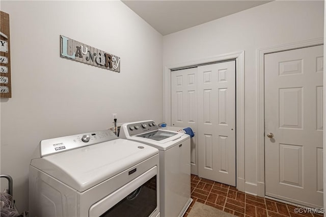 laundry room featuring independent washer and dryer