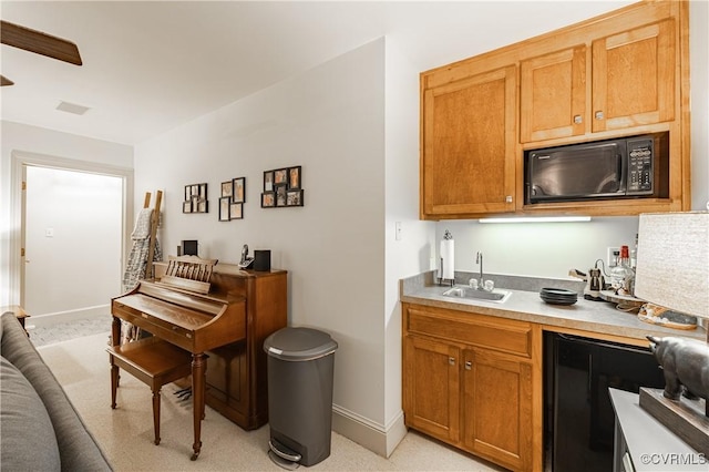 kitchen featuring sink and beverage cooler