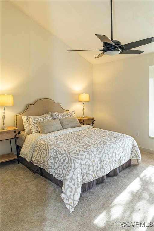 carpeted bedroom with ceiling fan