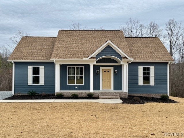 view of front of home with a front yard