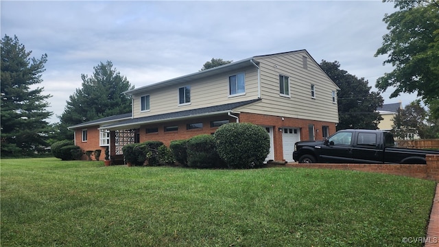 view of property with a garage and a front lawn