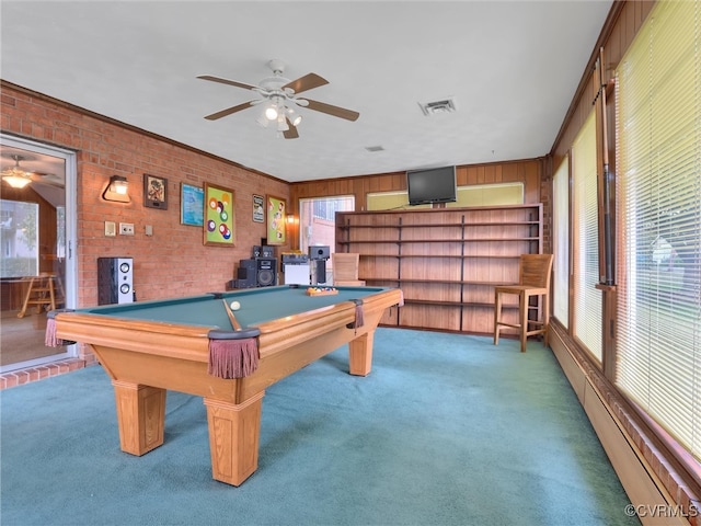 recreation room featuring carpet, ceiling fan, crown molding, billiards, and brick wall