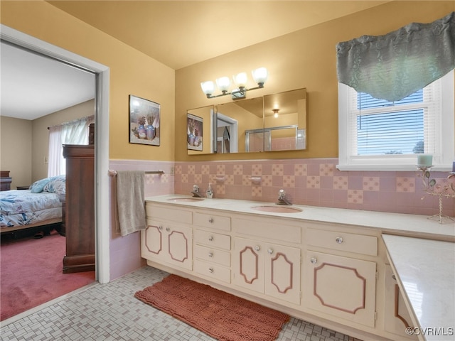 bathroom with vanity and a wealth of natural light