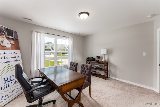 office space featuring light colored carpet