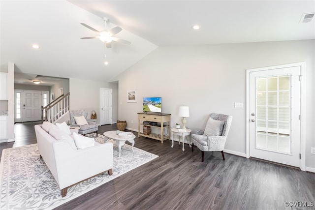 living room with vaulted ceiling, dark hardwood / wood-style floors, and ceiling fan