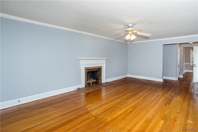 unfurnished living room featuring a fireplace, ornamental molding, hardwood / wood-style floors, and ceiling fan