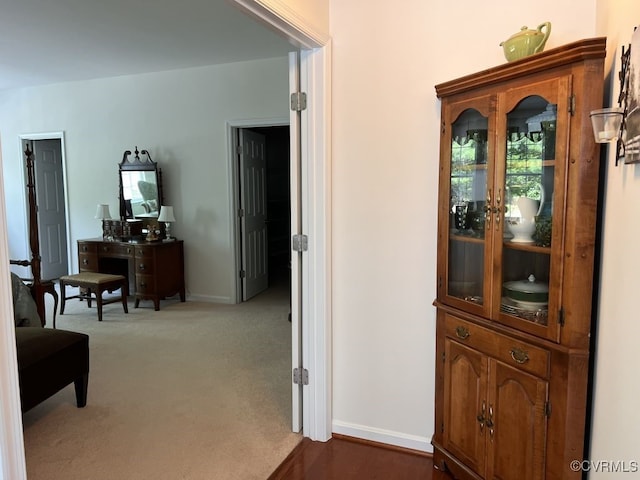 corridor featuring carpet flooring