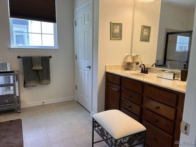 bathroom with vanity and an enclosed shower