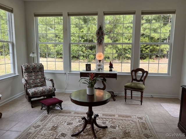 sitting room with light tile patterned floors