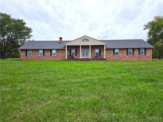 single story home featuring a front yard