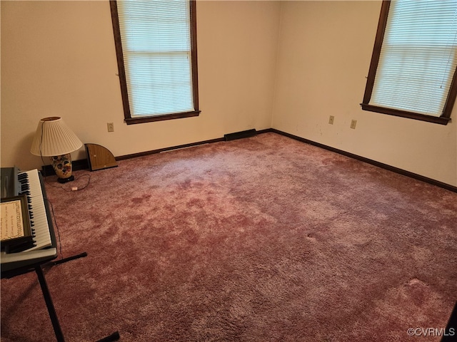 view of carpeted spare room