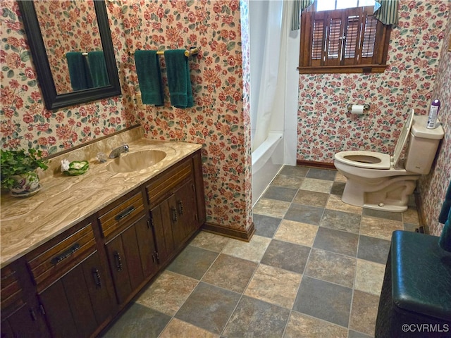 full bathroom with vanity, toilet, and shower / bath combo with shower curtain