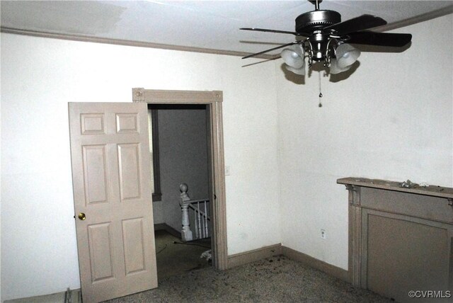 unfurnished room with ceiling fan