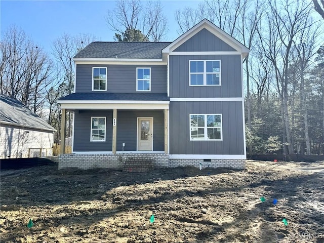 view of front of house featuring crawl space, covered porch, and roof with shingles